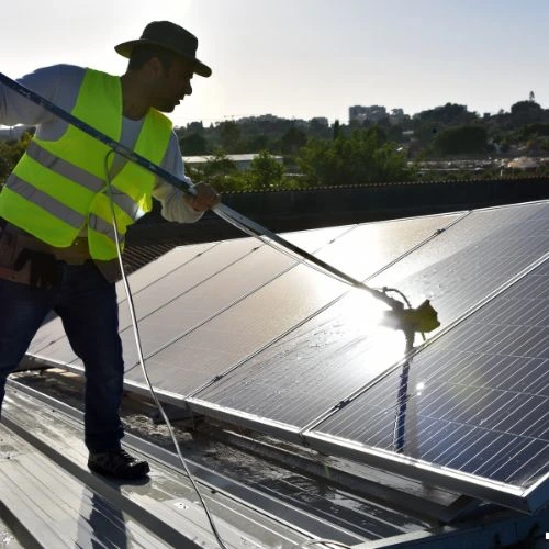 Expert solar panel cleaning in Lakeland, FL — Pressure Washing Lakeland Pros restoring maximum energy efficiency with safe, streak-free washing.