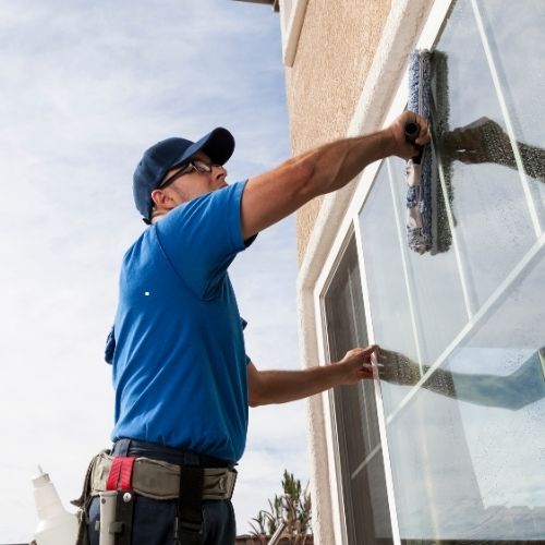 "Soft washing service in Lakeland FL using low-pressure cleaning to safely remove dirt, algae, and stains from roofs, siding, and delicate surfaces."
